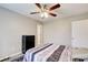 Bedroom featuring bed, dresser and ceiling fan at 335 Old Airport Rd, Carrollton, GA 30116