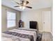 Bedroom featuring bed, dresser and ceiling fan at 335 Old Airport Rd, Carrollton, GA 30116