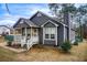 View of home's side and front showing neat landscaping and architectural details at 335 Old Airport Rd, Carrollton, GA 30116