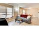 Open living space featuring large windows, hardwood floors, and access to dining area at 335 Old Airport Rd, Carrollton, GA 30116