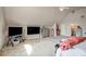 Large bedroom featuring vaulted ceiling and plenty of space at 1132 Venetian Ln, Hampton, GA 30228