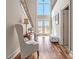 Grand foyer with hardwood floors, high ceilings, and elegant staircase, creating a welcoming entrance at 1132 Venetian Ln, Hampton, GA 30228