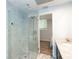 Modern bathroom featuring glass-enclosed shower, vanity, and tiled ceiling at 1247 Monroe Ne Dr, Atlanta, GA 30306