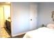 Bedroom with a connecting bathroom featuring a vanity with dual sinks at 1247 Monroe Ne Dr, Atlanta, GA 30306