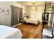 Bright bedroom with two twin beds, hardwood floors, and closet at 1247 Monroe Ne Dr, Atlanta, GA 30306