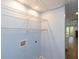 Functional laundry room with shelving and utility connections at 1247 Monroe Ne Dr, Atlanta, GA 30306