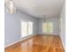Bright living room featuring hardwood floors, neutral walls and large windows that provide lots of natural light at 1247 Monroe Ne Dr, Atlanta, GA 30306