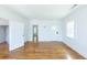 Spacious living room with hardwood floors, white walls, and natural light at 1247 Monroe Ne Dr, Atlanta, GA 30306