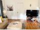 Bright living room with hardwood floors and contemporary decorative art at 1247 Monroe Ne Dr, Atlanta, GA 30306