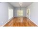 This bright living room features hardwood floors and plenty of light from the large windows at 1247 Monroe Ne Dr, Atlanta, GA 30306