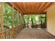 Relax on the screened porch with wooded views at 1247 Monroe Ne Dr, Atlanta, GA 30306