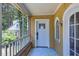 Inviting screened porch with white railing and view of the neighborhood at 1247 Monroe Ne Dr, Atlanta, GA 30306