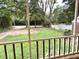 View from the screened-in porch looking out to the spacious front yard at 1247 Monroe Ne Dr, Atlanta, GA 30306