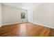 Cozy bedroom features hardwood floors, neutral walls, and a double door closet at 3087 Meadow Lark Ln, East Point, GA 30344