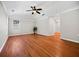 Spacious bedroom featuring hardwood floors, neutral walls, and ample natural light, creating a serene and inviting atmosphere at 3087 Meadow Lark Ln, East Point, GA 30344
