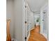 Hallway with hardwood floors and access to the bathroom and bedroom featuring natural light at 3087 Meadow Lark Ln, East Point, GA 30344