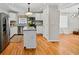 Bright kitchen with white cabinets, stainless steel appliances, and center island at 3087 Meadow Lark Ln, East Point, GA 30344