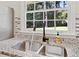 Kitchen sink with stylish faucet and granite countertops overlooking a backyard view at 3087 Meadow Lark Ln, East Point, GA 30344