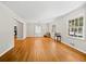 Bright living room with hardwood floors seamlessly connecting to other spaces at 3087 Meadow Lark Ln, East Point, GA 30344