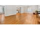 Inviting living room with beautiful hardwood floors seamlessly connecting to kitchen at 3087 Meadow Lark Ln, East Point, GA 30344