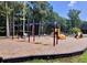 Community playground with swings, slides and fun things for the children to do at 3087 Meadow Lark Ln, East Point, GA 30344