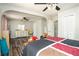 A bedroom featuring a ceiling fan, a dresser, and light-toned walls at 2690 Manassas Pl, Snellville, GA 30039