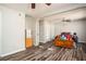 A bedroom featuring a ceiling fan, an open closet, and light-toned walls at 2690 Manassas Pl, Snellville, GA 30039