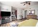 Main bedroom featuring a ceiling fan, built-in dresser and access to ensuite bathroom at 2690 Manassas Pl, Snellville, GA 30039