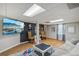 Basement area with a TV, luxury vinyl plank flooring and cozy seating at 3231 Boulder Brook Dr, Lithonia, GA 30038