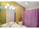 This bathroom features a modern vanity, a large mirror, and stylish lighting, providing a fresh space at 3231 Boulder Brook Dr, Lithonia, GA 30038