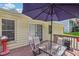 Cozy outdoor deck featuring a table with seating, perfect for dining and relaxing at 3231 Boulder Brook Dr, Lithonia, GA 30038
