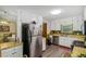 Traditional kitchen featuring stainless steel appliances, light wood color countertops, and white cabinets at 3231 Boulder Brook Dr, Lithonia, GA 30038