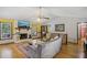 Cozy living room with fireplace, bamboo flooring, and vaulted ceiling at 3231 Boulder Brook Dr, Lithonia, GA 30038