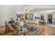 Open-concept living room with bamboo flooring and views to breakfast area at 3231 Boulder Brook Dr, Lithonia, GA 30038