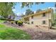Well-maintained home with landscaped yard featuring mature plantings at 3231 Boulder Brook Dr, Lithonia, GA 30038