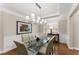 Bright dining room with hardwood floors and natural light at 4070 Preserve Crossing Ln, Cumming, GA 30040