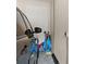 Garage with golf clubs and a car at 4070 Preserve Crossing Ln, Cumming, GA 30040