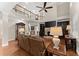 Spacious living room features hardwood floors, fireplace, built-in bookshelves, and a soaring ceiling at 4070 Preserve Crossing Ln, Cumming, GA 30040
