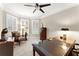 Bright home office with large windows and ample natural light at 4070 Preserve Crossing Ln, Cumming, GA 30040