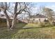 Fenced backyard featuring mature trees and lush lawn at 1084 Kirkwood Se Ave, Atlanta, GA 30316