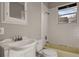 Cozy bathroom with a tub and shower combination and vanity with a sink at 1084 Kirkwood Se Ave, Atlanta, GA 30316