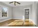 Bedroom with hardwood floors featuring ensuite bathroom at 1084 Kirkwood Se Ave, Atlanta, GA 30316