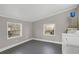 Utility room featuring modern washer and dryer, and bright windows at 1084 Kirkwood Se Ave, Atlanta, GA 30316