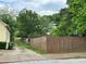 Fenced side yard and driveway at 1084 Kirkwood Se Ave, Atlanta, GA 30316