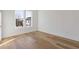 Bedroom with a window allowing natural light to illuminate the wood flooring at 481 Hammons Way, Atlanta, GA 30315