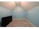 Attic space with blue accent wall at 260 Shadowbrooke Dr, Loganville, GA 30052