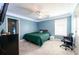 Bedroom with updated lighting, new paint and plush carpet at 260 Shadowbrooke Dr, Loganville, GA 30052