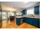 This kitchen features stainless steel appliances and an eat in kitchen with views to the back yard at 260 Shadowbrooke Dr, Loganville, GA 30052
