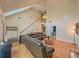 Spacious living room with a vaulted ceiling, hardwood floors, and a cozy seating area at 260 Shadowbrooke Dr, Loganville, GA 30052