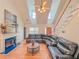 Bright living room with vaulted ceiling, fireplace, hardwood flooring, and comfortable seating at 260 Shadowbrooke Dr, Loganville, GA 30052